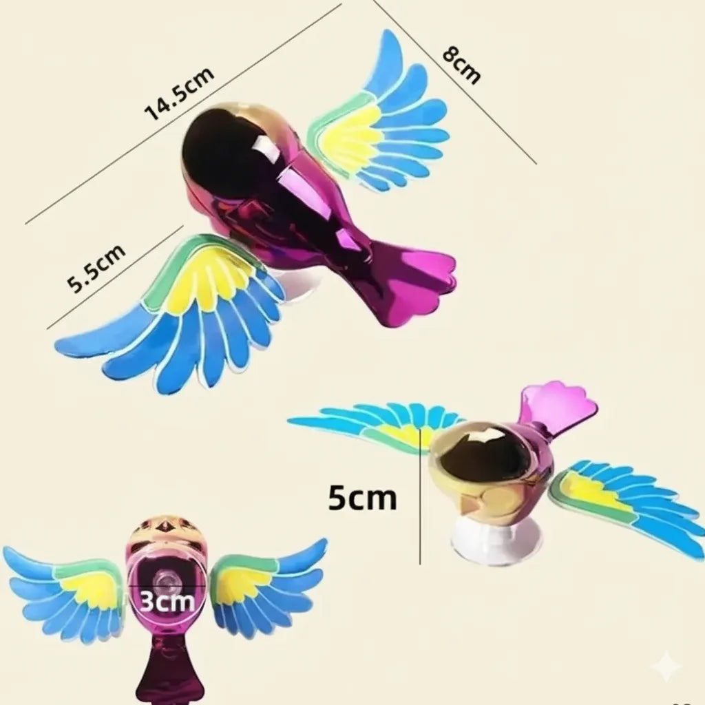 Colorful winged object with measurements on a beige background
